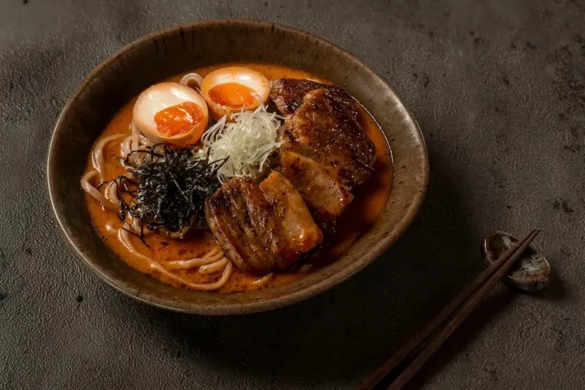 Bowl of authentic ramen with pork, eggs, and noodles served in Ubud.