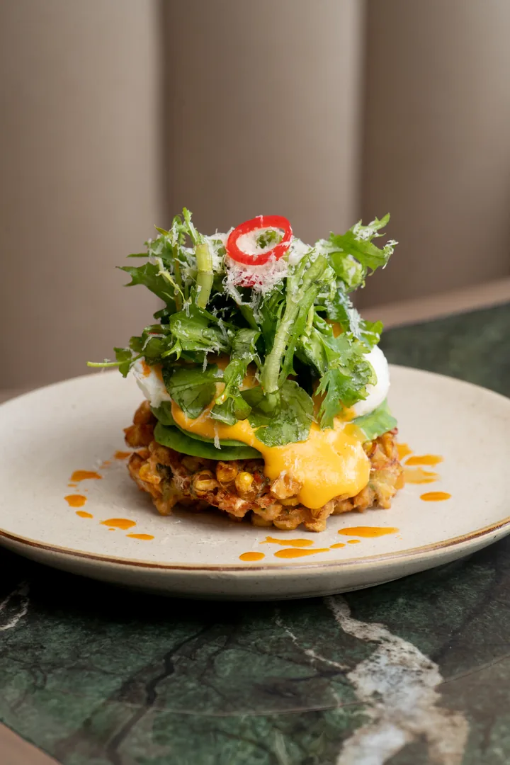Wisteria brunch dish with avocado and greens